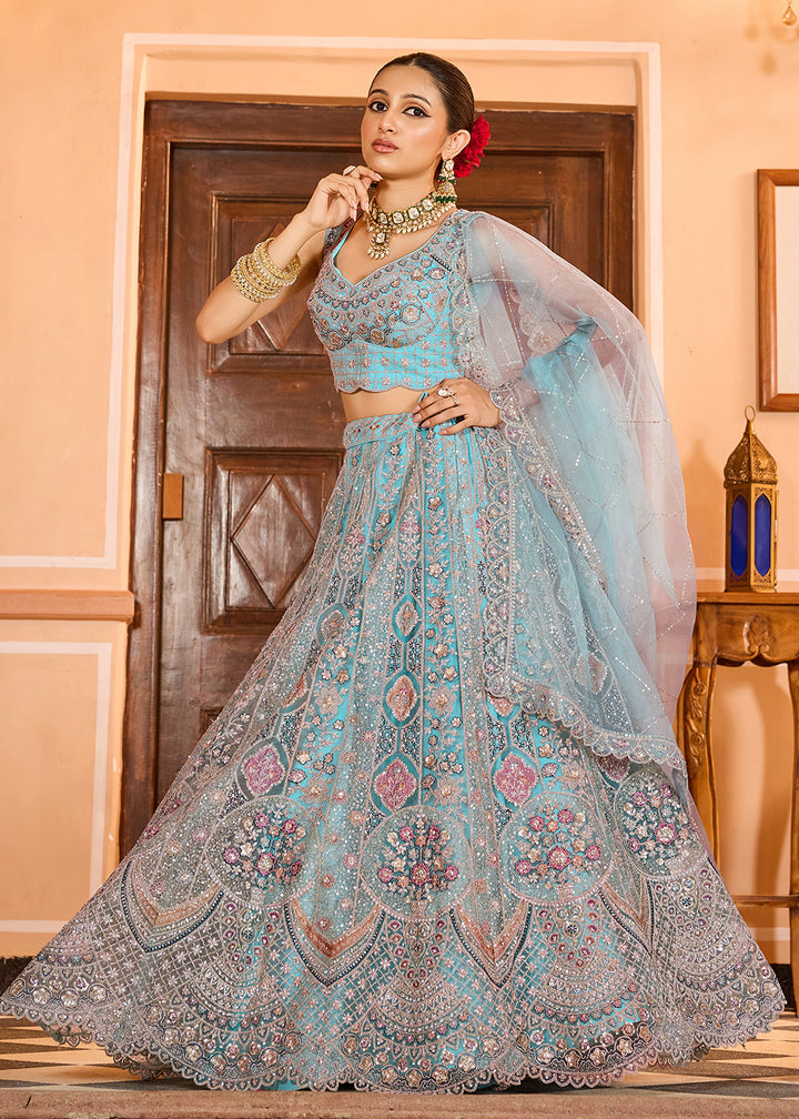 Buy Now Turquoise Premium Quality Net Wedding Festive Lehenga Choli Online in US, UK, Canada, France, Germany, Sweden, Greece, Denmark & Worldwide at Empress.