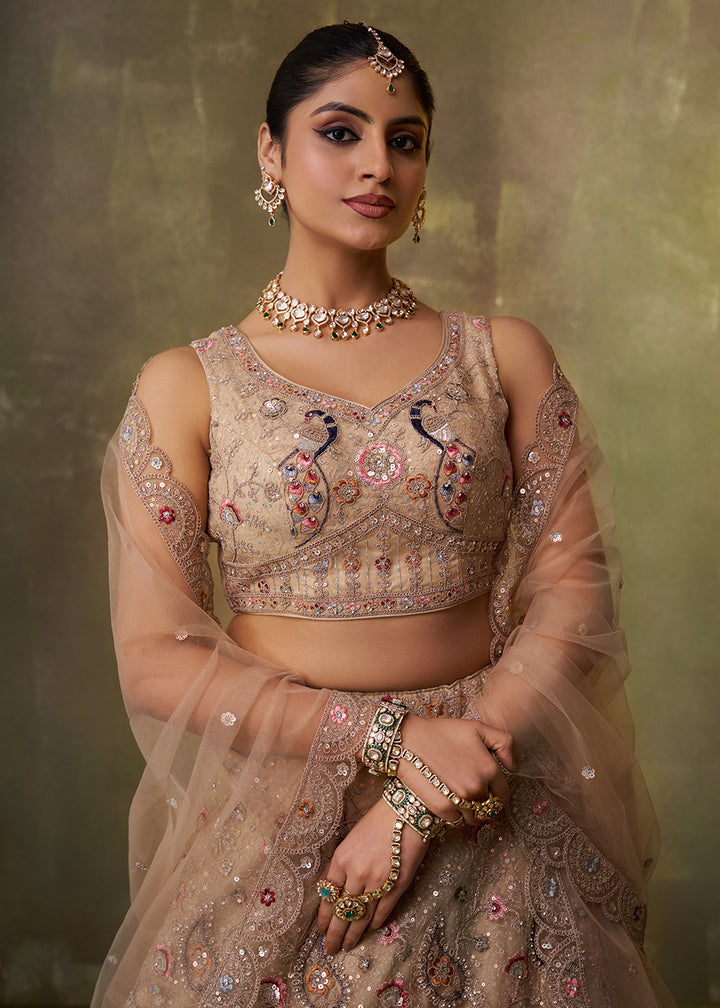 Buy Now Beige Stone & Cording Work Net Lehenga Choli Online in US, UK, Canada, France, Germany, Sweden, Greece, Denmark, Italy, Africa & Worldwide at Empress.