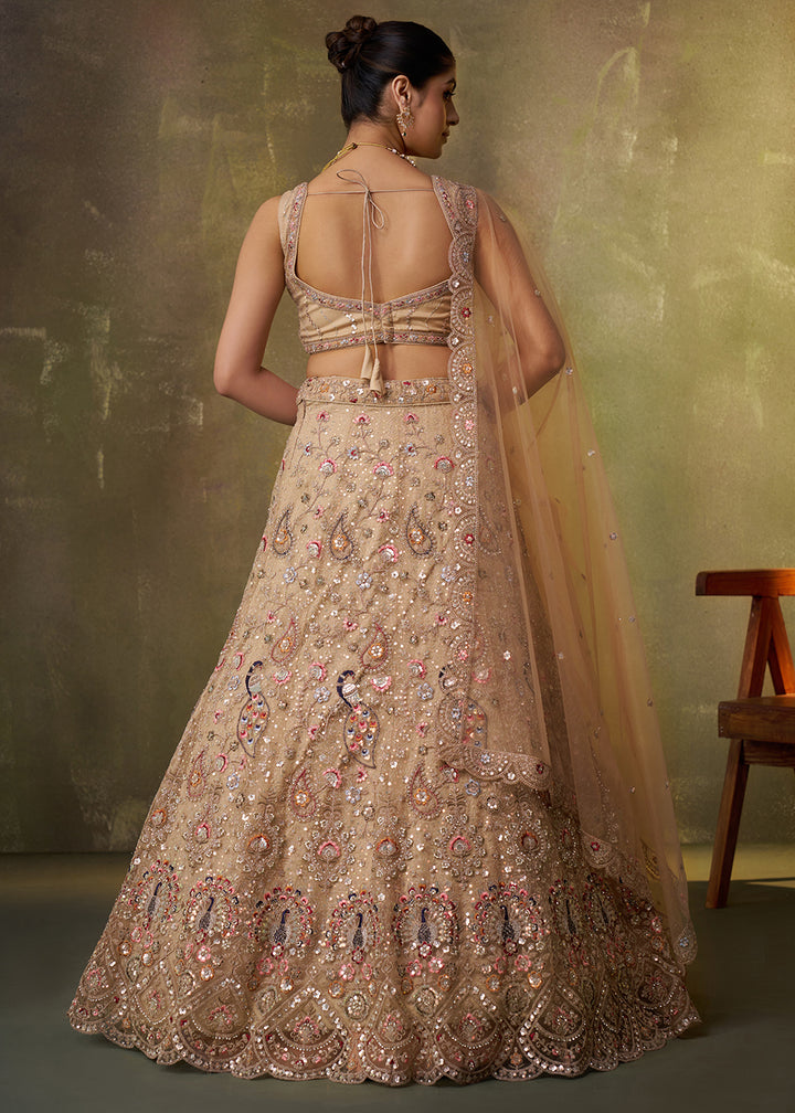 Buy Now Beige Stone & Cording Work Net Lehenga Choli Online in US, UK, Canada, France, Germany, Sweden, Greece, Denmark, Italy, Africa & Worldwide at Empress.