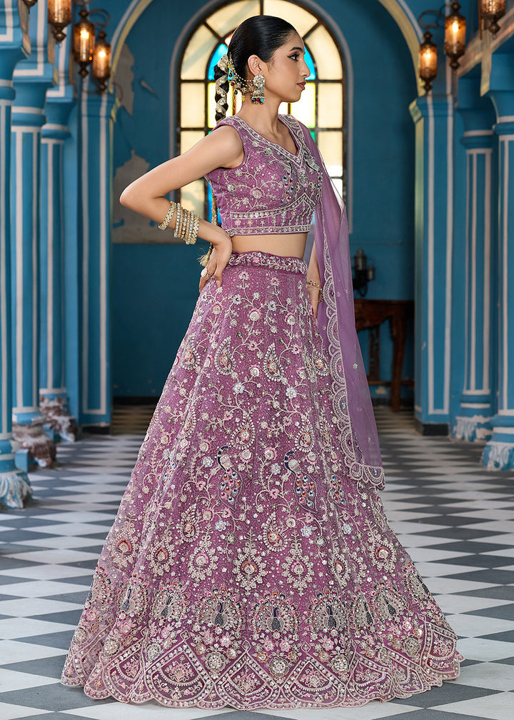 Buy Now Lavender Stone & Cording Work Net Lehenga Choli Online in US, UK, Canada, France, Germany, Sweden, Greece, Denmark, Italy, Africa & Worldwide at Empress.