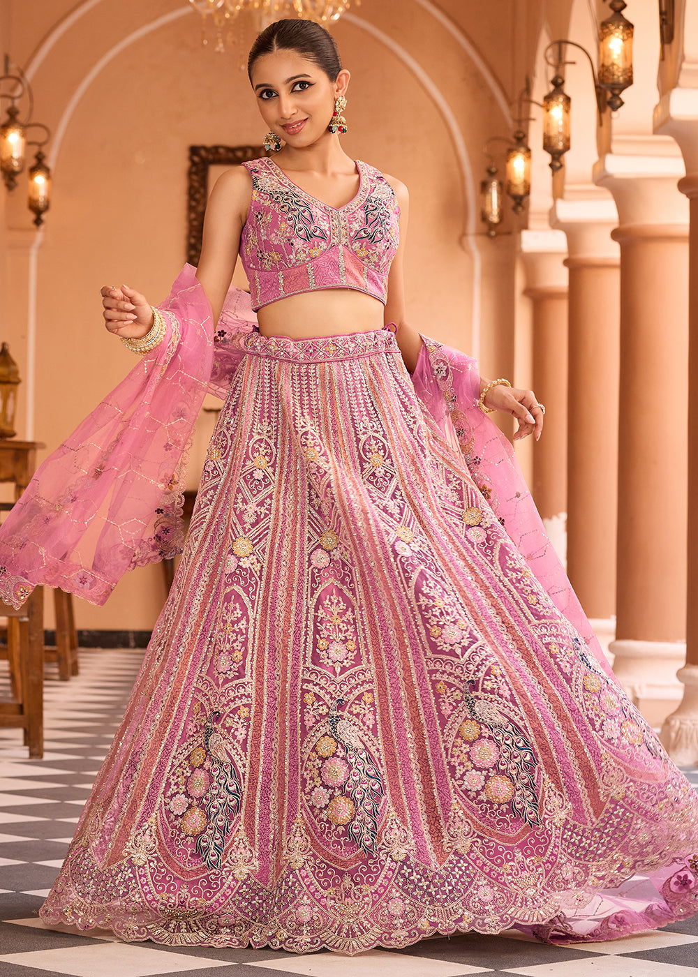 Buy Now Adorable Pink Net Embroidered Bridesmaids Lehenga Choli Online in US, UK, Canada, France, Germany, Sweden, Greece, Denmark, Italy & Worldwide at Empress.
