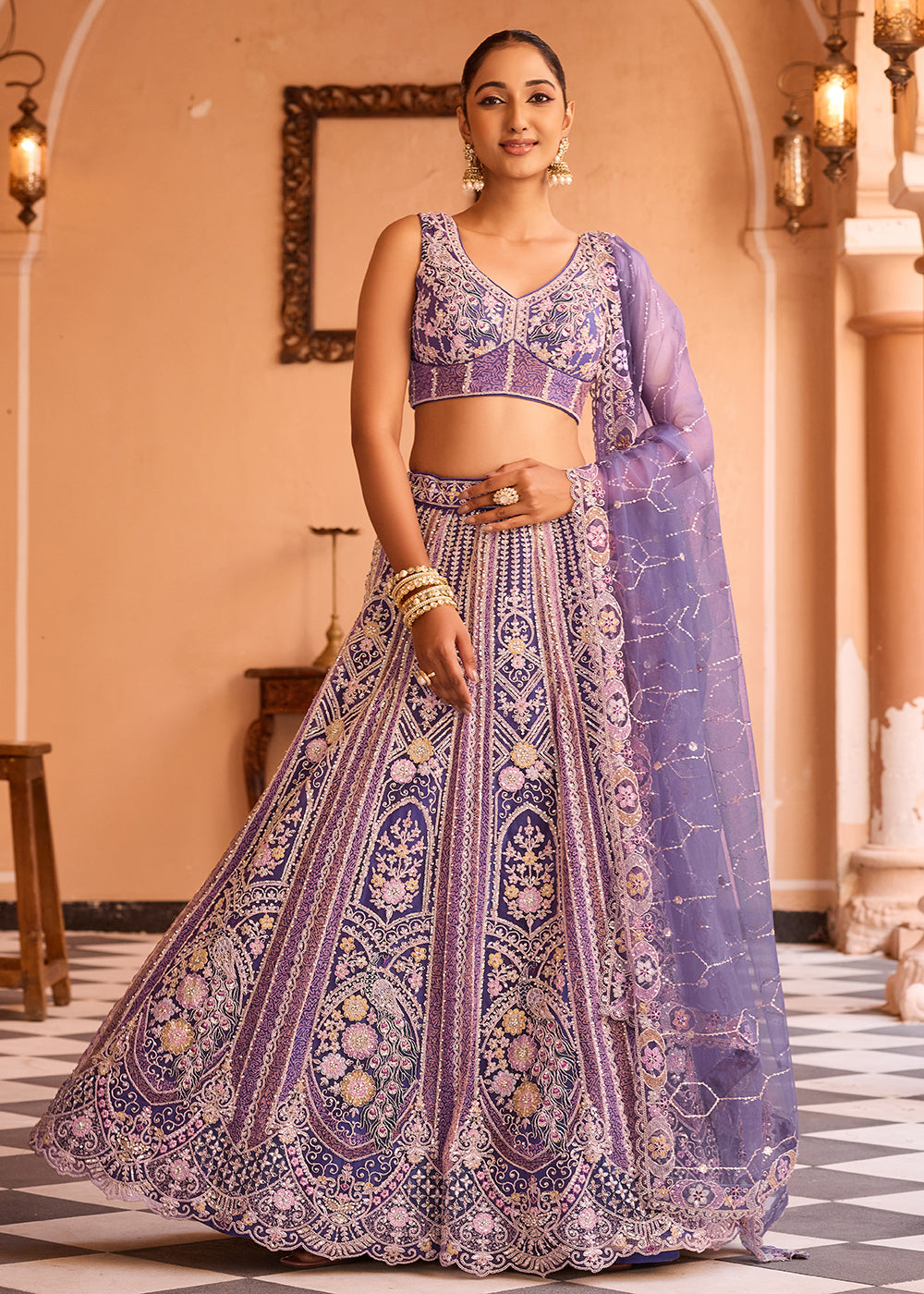 Buy Now Adorable Purple Net Embroidered Bridesmaids Lehenga Choli Online in US, UK, Canada, France, Germany, Sweden, Greece, Denmark & Worldwide at Empress.