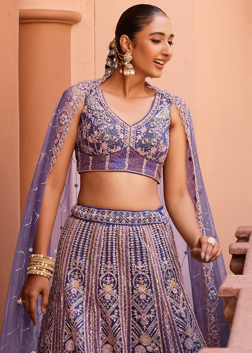Buy Now Adorable Purple Net Embroidered Bridesmaids Lehenga Choli Online in US, UK, Canada, France, Germany, Sweden, Greece, Denmark & Worldwide at Empress.