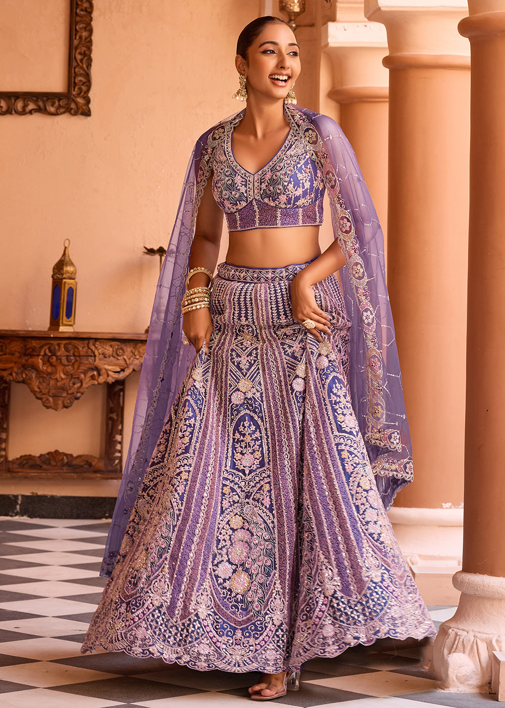 Buy Now Adorable Purple Net Embroidered Bridesmaids Lehenga Choli Online in US, UK, Canada, France, Germany, Sweden, Greece, Denmark & Worldwide at Empress.