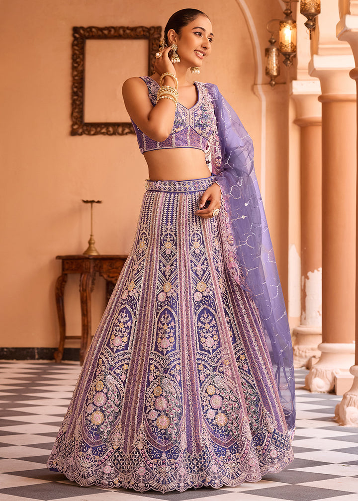 Buy Now Adorable Purple Net Embroidered Bridesmaids Lehenga Choli Online in US, UK, Canada, France, Germany, Sweden, Greece, Denmark & Worldwide at Empress.