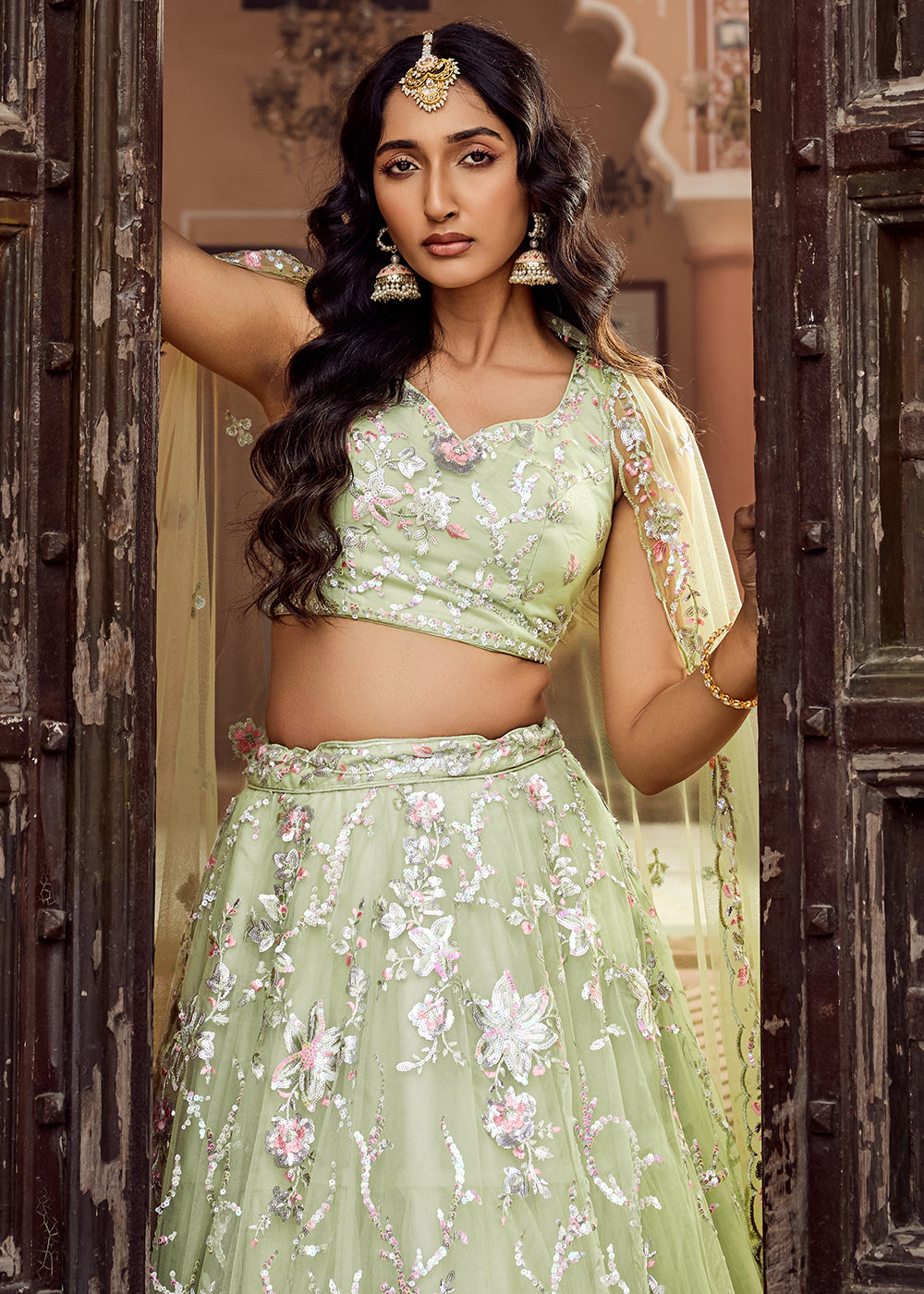 Buy Now Net Embroidered Lime Green Festive Style Lehenga Choli Online in US, UK, Canada, France, Germany, Sweden, Greece, Denmark, UAE & Worldwide at Empress.