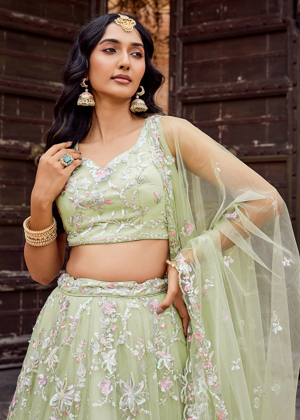 Buy Now Net Embroidered Lime Green Festive Style Lehenga Choli Online in US, UK, Canada, France, Germany, Sweden, Greece, Denmark, UAE & Worldwide at Empress.