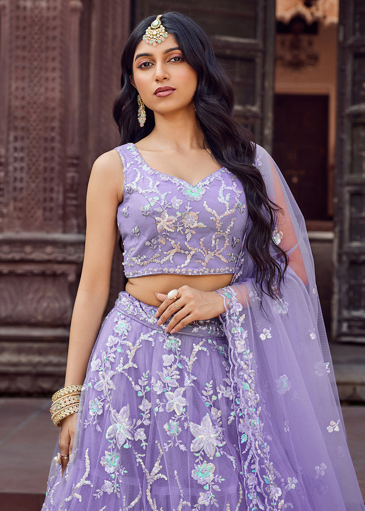 Buy Now Net Embroidered Mauve Festive Style Lehenga Choli Online in US, UK, Canada, France, Germany, Sweden, Greece, Denmark, UAE & Worldwide at Empress.