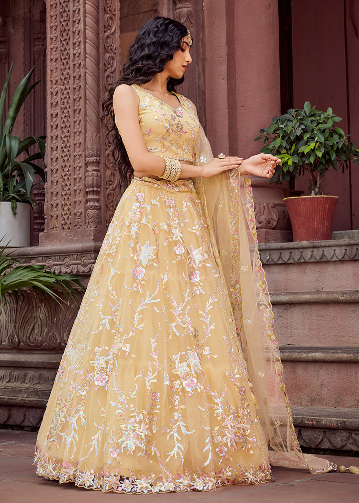 Buy Now Net Embroidered Yellow Festive Style Lehenga Choli Online in US, UK, Canada, France, Germany, Sweden, Greece, Denmark, UAE & Worldwide at Empress.