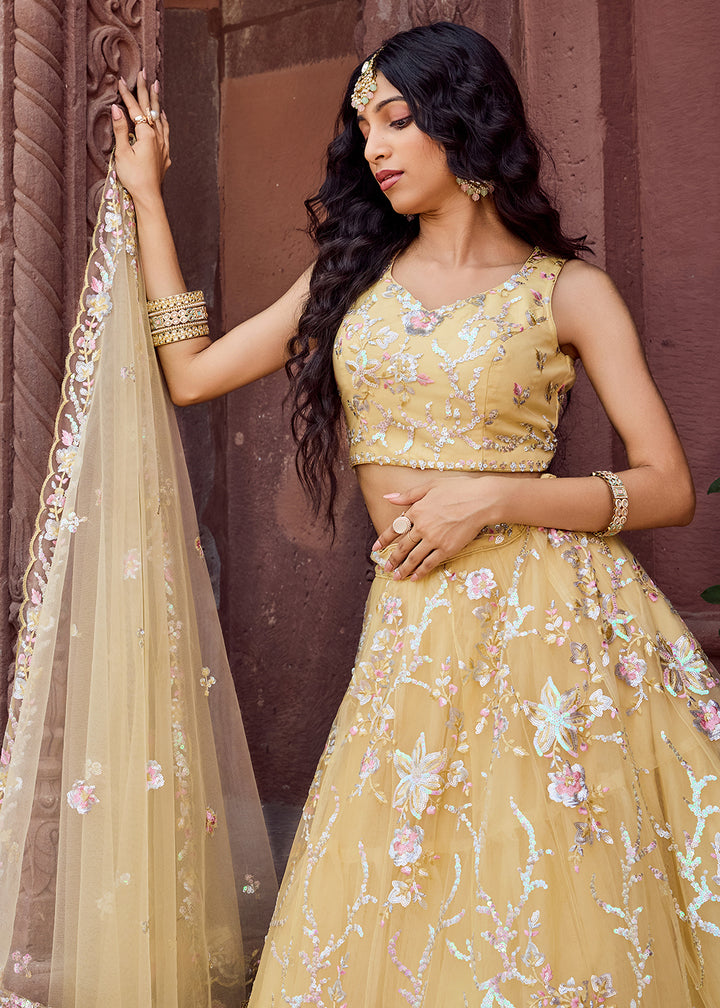 Buy Now Net Embroidered Yellow Festive Style Lehenga Choli Online in US, UK, Canada, France, Germany, Sweden, Greece, Denmark, UAE & Worldwide at Empress.