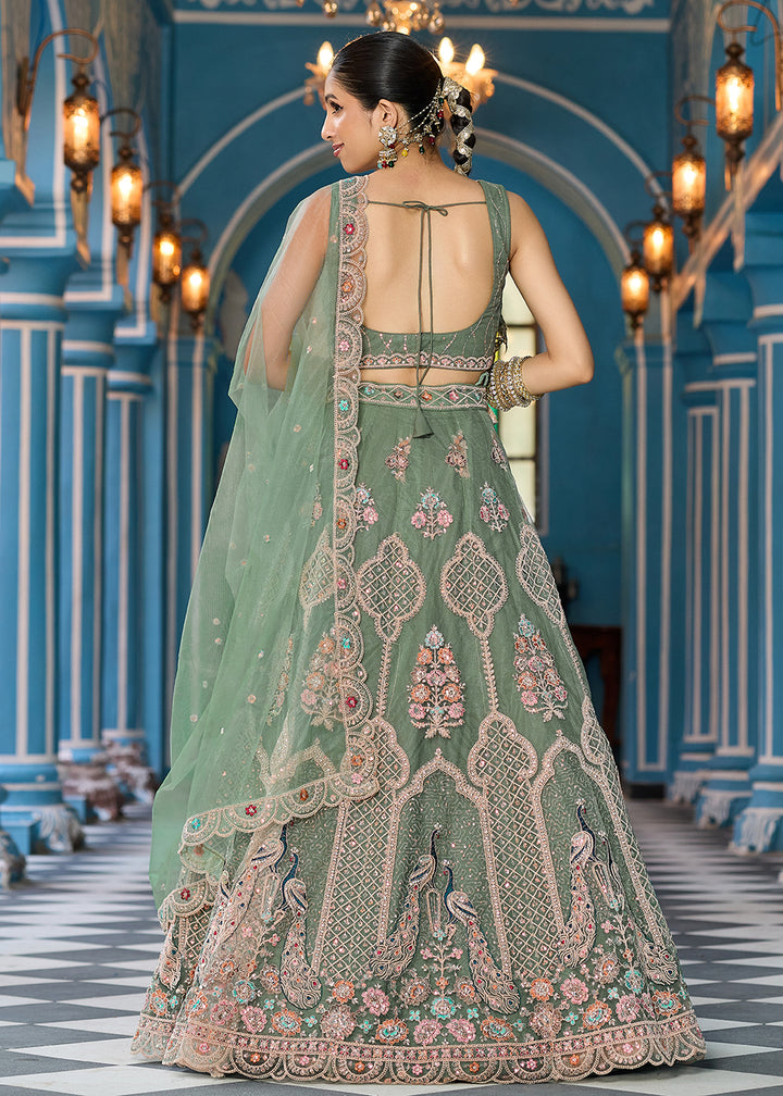 Buy Now Green Net Wedding Function Style Lehenga Choli Online in US, UK, Canada, France, Germany, Sweden, Greece, Denmark, Maldives, UAE & Worldwide at Empress.
