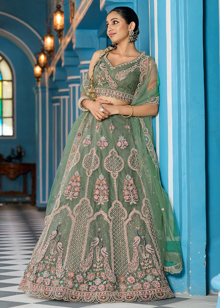 Buy Now Green Net Wedding Function Style Lehenga Choli Online in US, UK, Canada, France, Germany, Sweden, Greece, Denmark, Maldives, UAE & Worldwide at Empress.