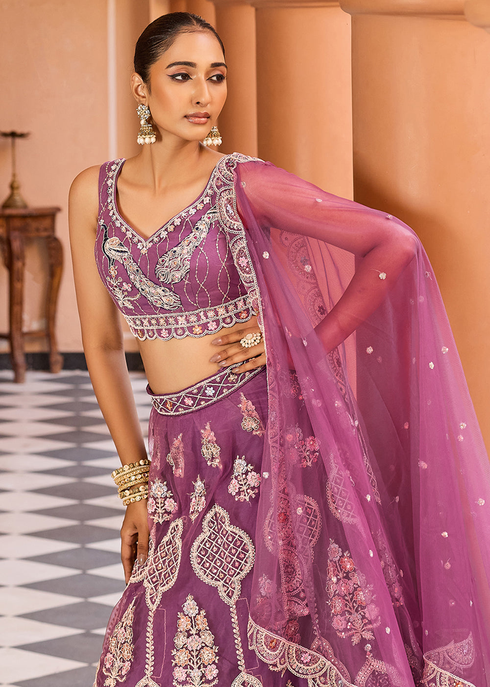 Buy Now Lavender Net Wedding Function Style Lehenga Choli Online in US, UK, Canada, France, Germany, Sweden, Greece, Denmark, Maldives, UAE & Worldwide at Empress.