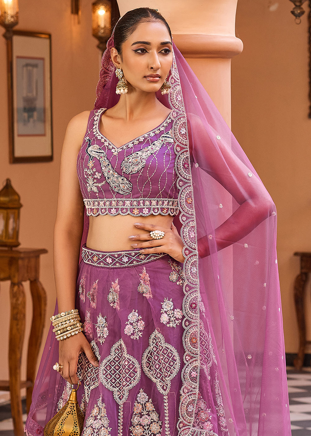 Buy Now Lavender Net Wedding Function Style Lehenga Choli Online in US, UK, Canada, France, Germany, Sweden, Greece, Denmark, Maldives, UAE & Worldwide at Empress.