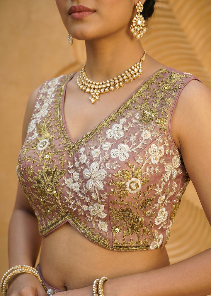 Buy Now Rose Gold Tissue Beads Embroidered Lehenga Choli with Dupatta Online in US, UK, Canada, France, Italy, Germany, Sweden, Denmark &amp; Worldwide at Empress.