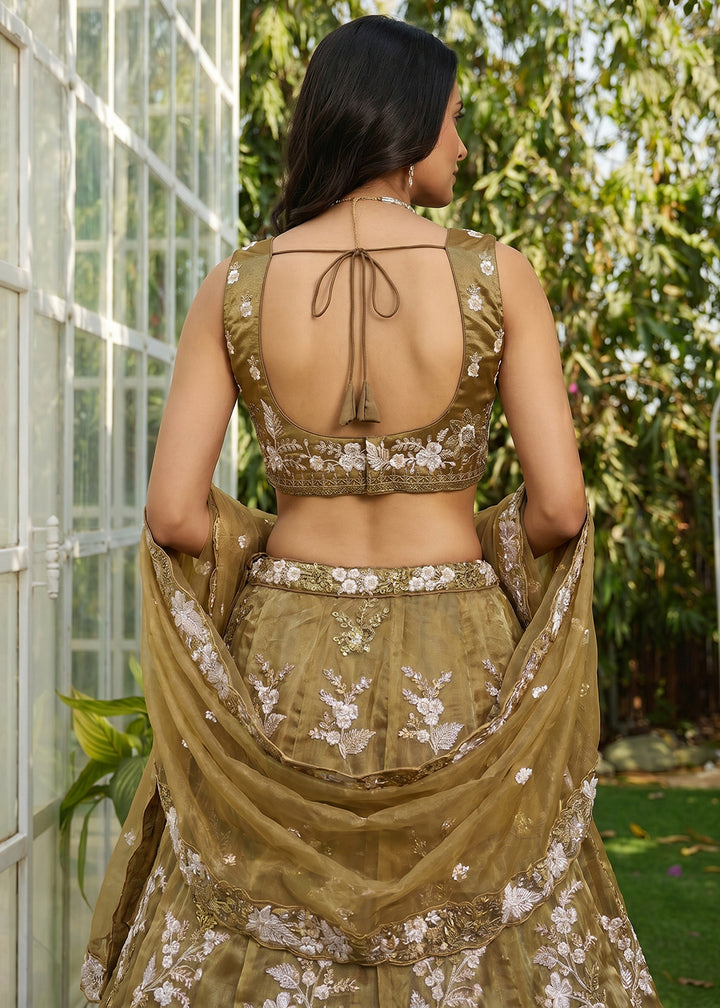 Buy Now Golden Tissue Beads Embroidered Lehenga Choli with Dupatta Online in US, UK, Canada, France, Italy, Germany, Sweden, Denmark &amp; Worldwide at Empress.