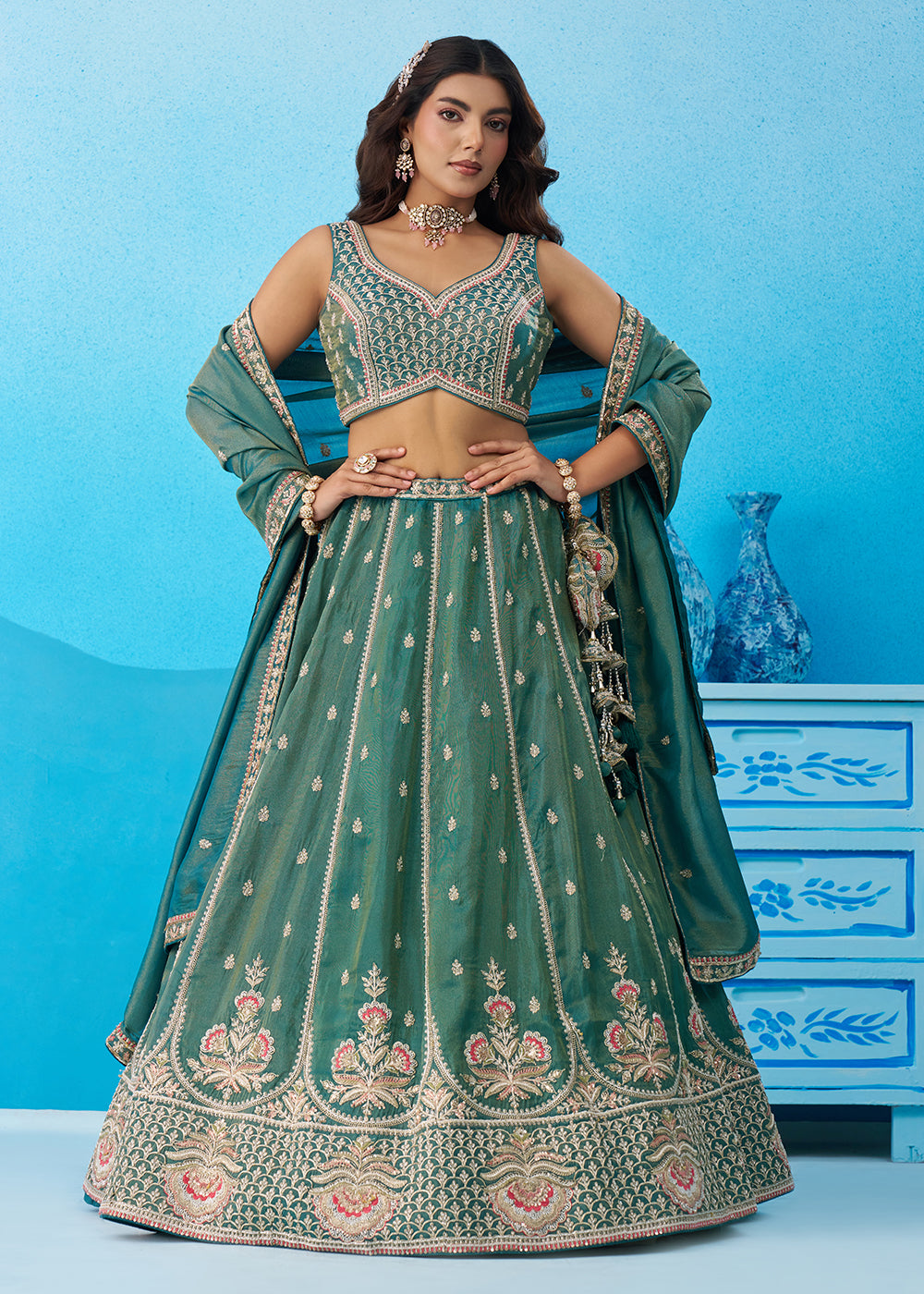 Buy Now Premium Teal Tissue Floral Embroidered Lehenga Choli Online in US, UK, Canada, France, Italy, Germany, Australia, Greece, UAE & Worldwide at Empress.