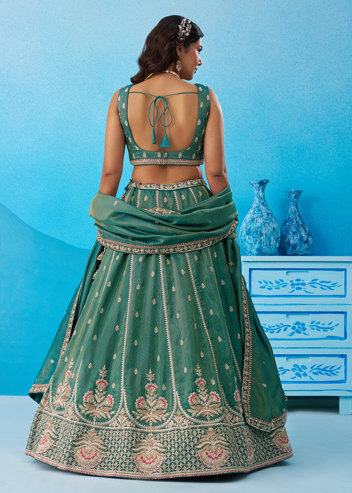 Buy Now Premium Teal Tissue Floral Embroidered Lehenga Choli Online in US, UK, Canada, France, Italy, Germany, Australia, Greece, UAE & Worldwide at Empress.