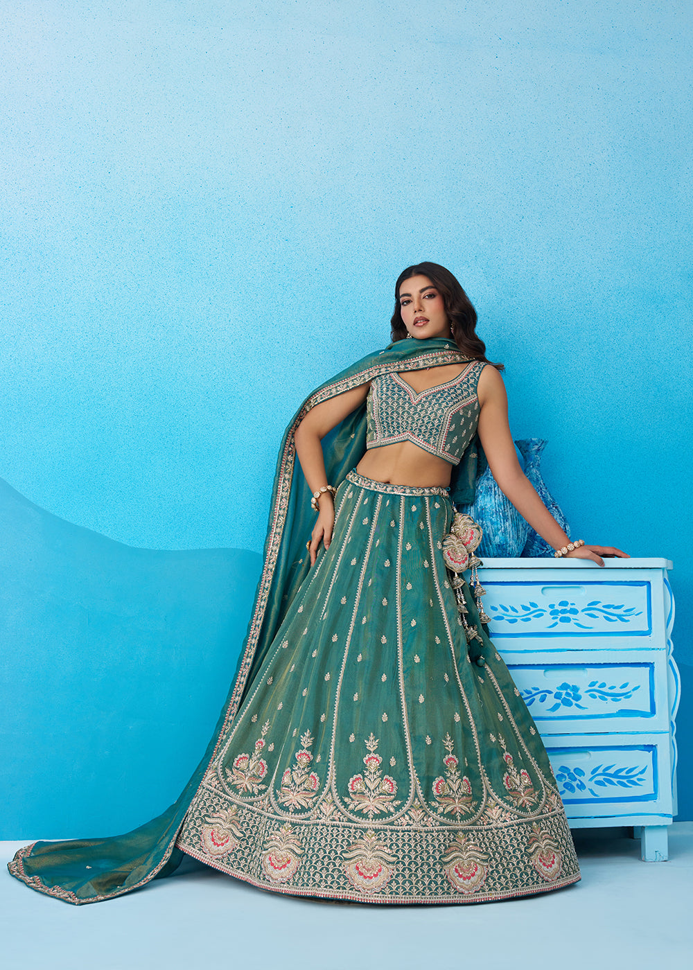 Buy Now Premium Teal Tissue Floral Embroidered Lehenga Choli Online in US, UK, Canada, France, Italy, Germany, Australia, Greece, UAE & Worldwide at Empress.