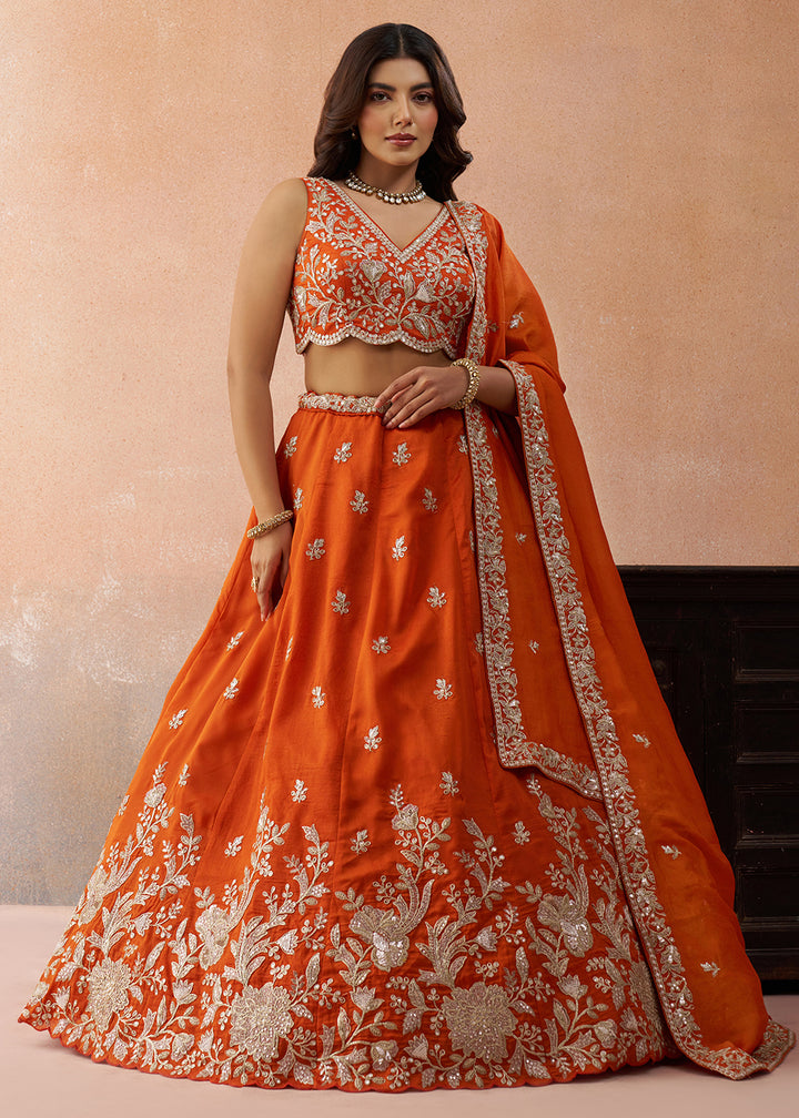 Buy Now Sequins & Cording Threads Orange Tissue Lehenga Choli Online in US, UK, Canada, France, Italy, Germany, Australia, Greece, UAE & Worldwide at Empress.