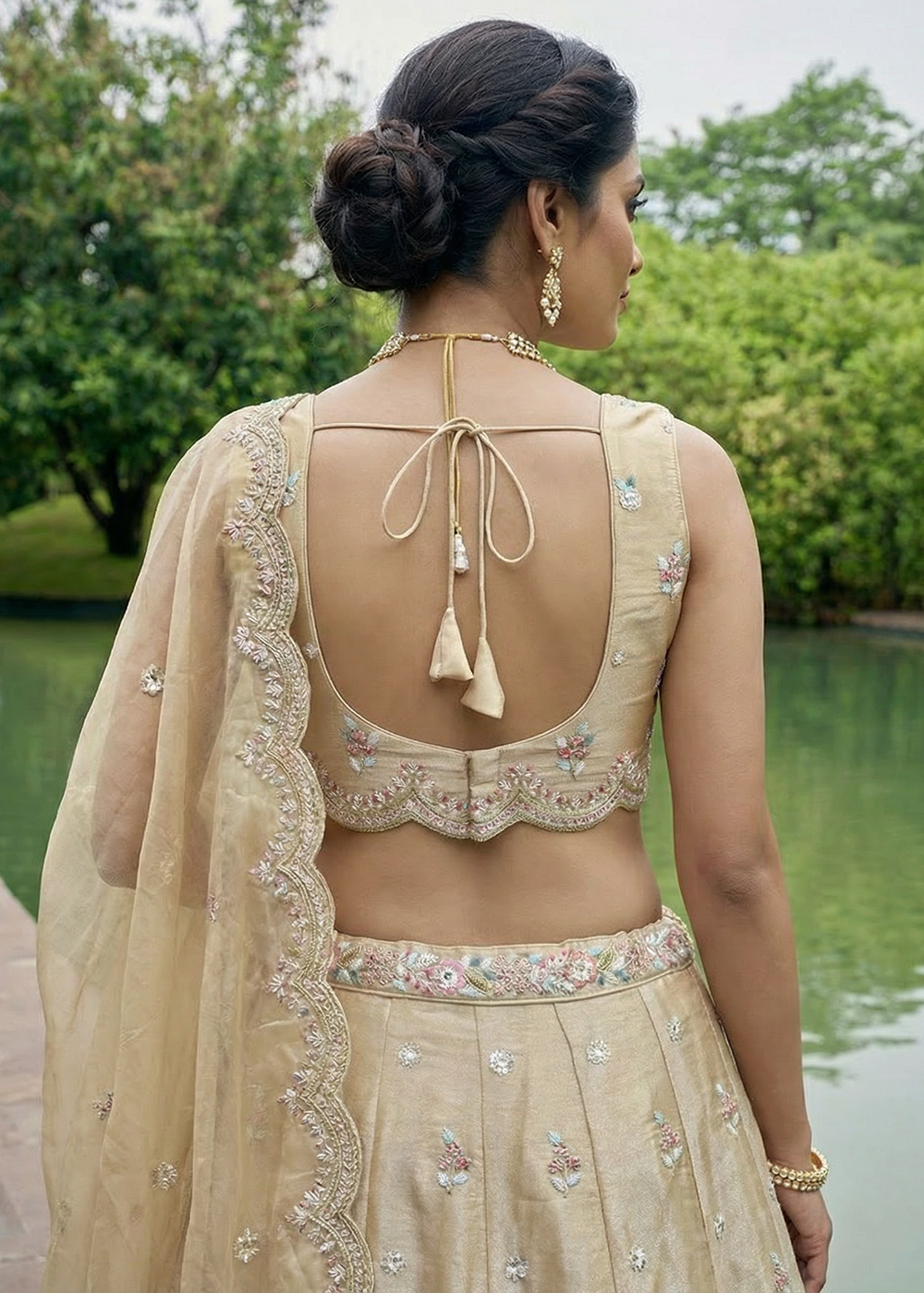 Buy Now Beige Tissue Mirror Sequince Embroidered Lehenga Choli Online in US, UK, Canada, France, Italy, Germany, Sweden, Denmark, Austria &amp; Worldwide at Empress.