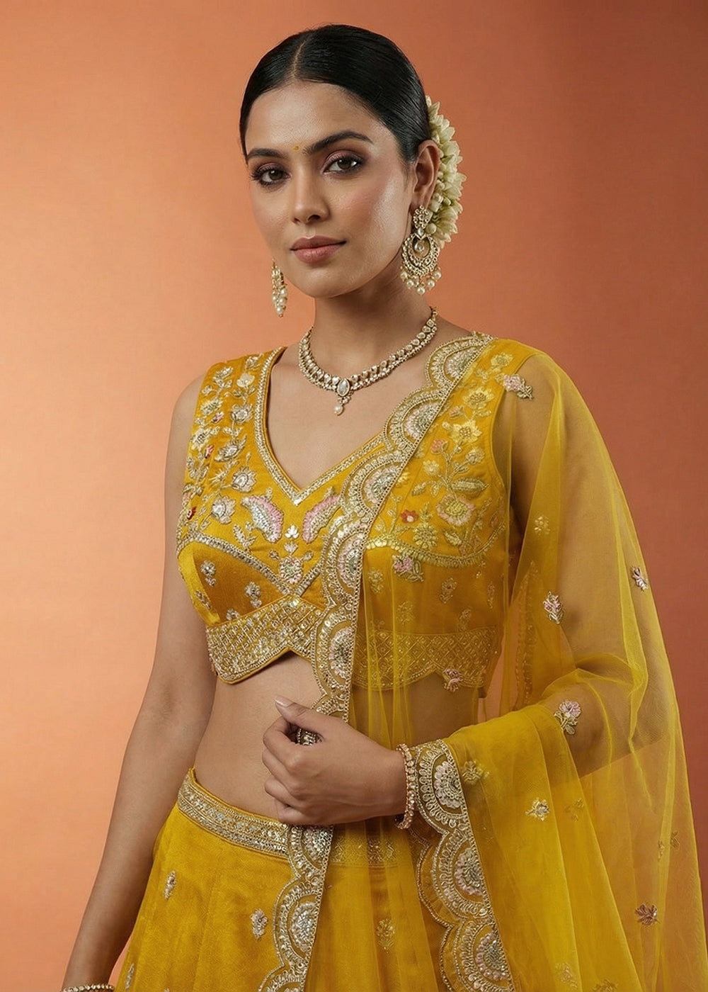 Buy Mustard Chinnon Silk Motif with Sequins Embroidered Lehenga Choli Online in US, UK, Canada, France, Italy, Germany, Sweden, Austria &amp; Worldwide at Empress.
