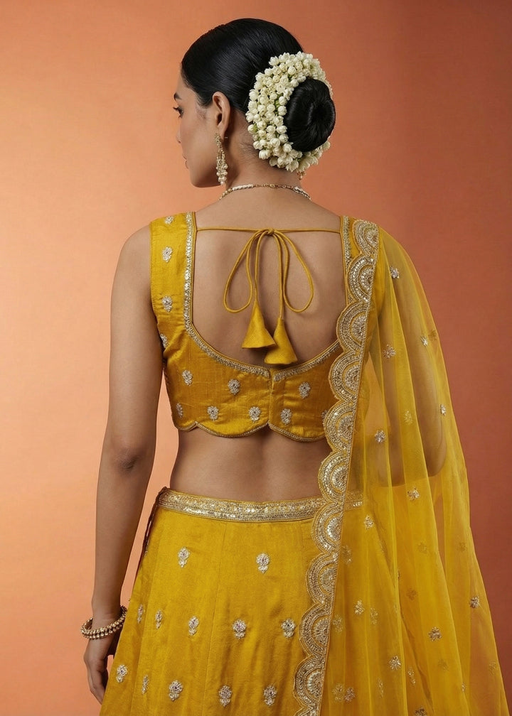 Buy Mustard Chinnon Silk Motif with Sequins Embroidered Lehenga Choli Online in US, UK, Canada, France, Italy, Germany, Sweden, Austria &amp; Worldwide at Empress.