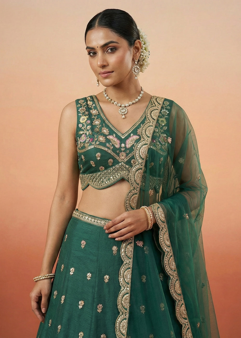 Buy Green Chinnon Silk Motif with Sequins Embroidered Lehenga Choli Online in US, UK, Canada, France, Italy, Germany, Sweden, Austria & Worldwide at Empress.