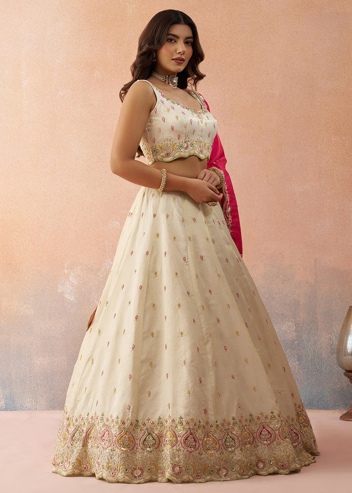 Buy Now Cream Cosmos Silk Embroidered Festive Lehenga Choli Online in US, UK, Canada, France, Italy, Germany, Australia, Greece, UAE & Worldwide at Empress.