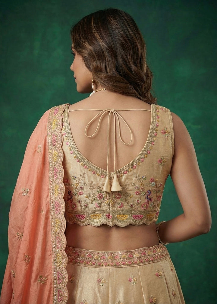 Buy Now Beige Tissue Zarkan Embroidered Wedding Lehenga Choli Online in US, UK, Canada, France, Italy, Germany, Sweden, Austria, UAE &amp; Worldwide at Empress.