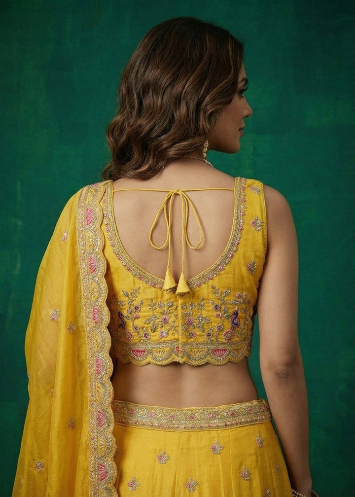 Buy Now Yellow Tissue Zarkan Embroidered Wedding Lehenga Choli Online in US, UK, Canada, France, Italy, Germany, Sweden, Austria, UAE &amp; Worldwide at Empress.