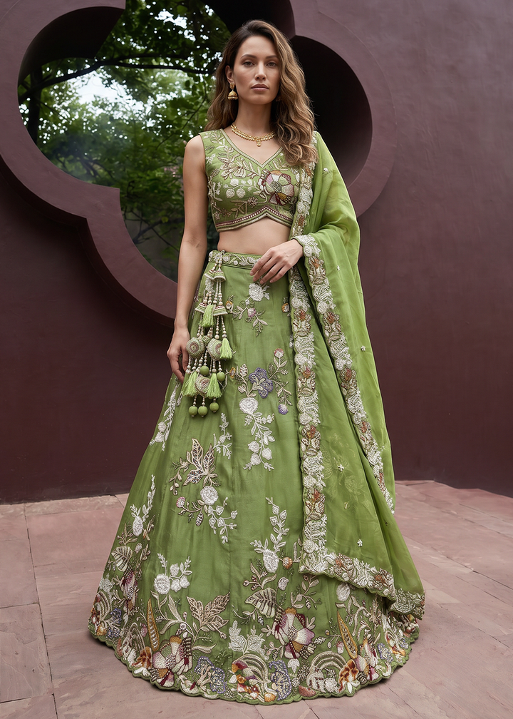 Buy Now Green Tissue Woolen Embroidered Wedding Party Lehenga Choli Online in US, UK, Canada, France, Italy, Germany, Sweden, Austria &amp; Worldwide at Empress.