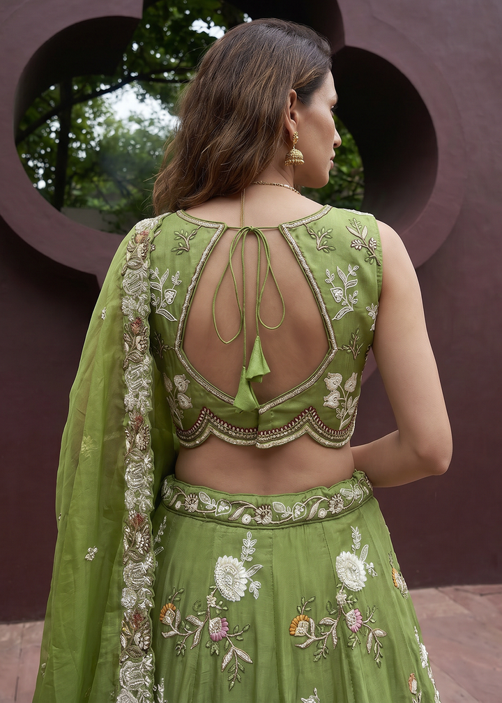 Buy Now Green Tissue Woolen Embroidered Wedding Party Lehenga Choli Online in US, UK, Canada, France, Italy, Germany, Sweden, Austria &amp; Worldwide at Empress.
