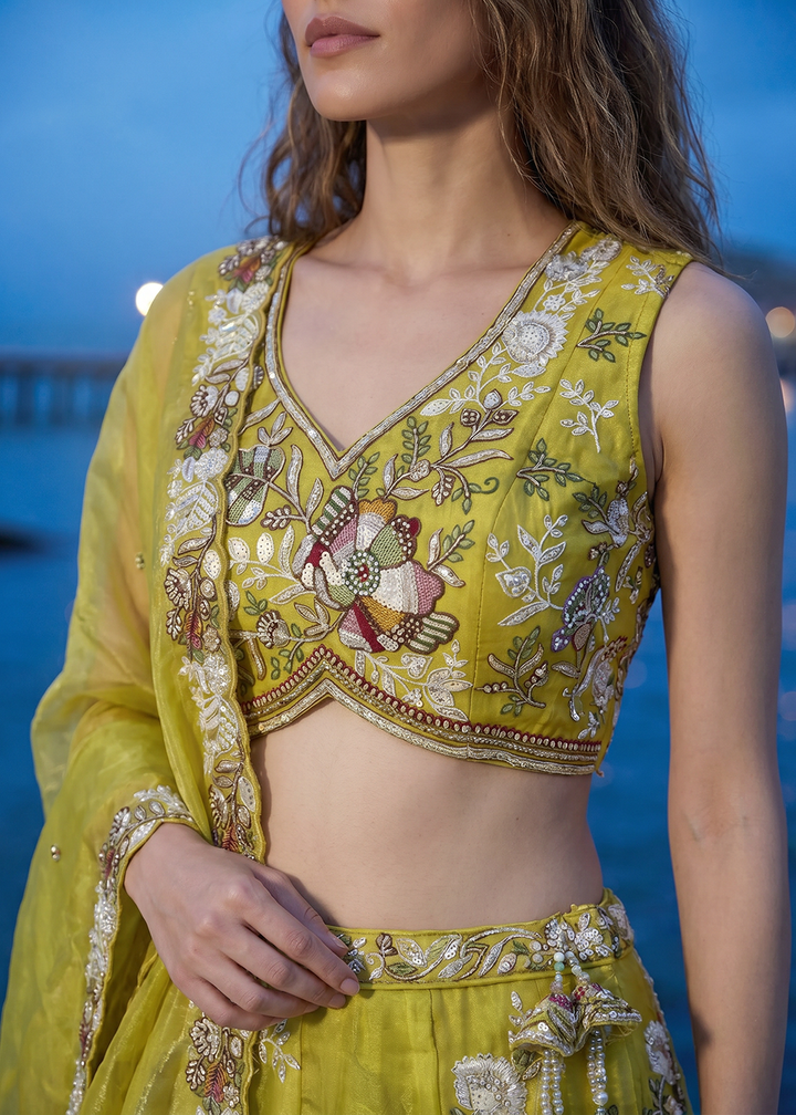 Buy Now Yellow Tissue Woolen Embroidered Wedding Party Lehenga Choli Online in US, UK, Canada, France, Italy, Germany, Sweden, Austria &amp; Worldwide at Empress.