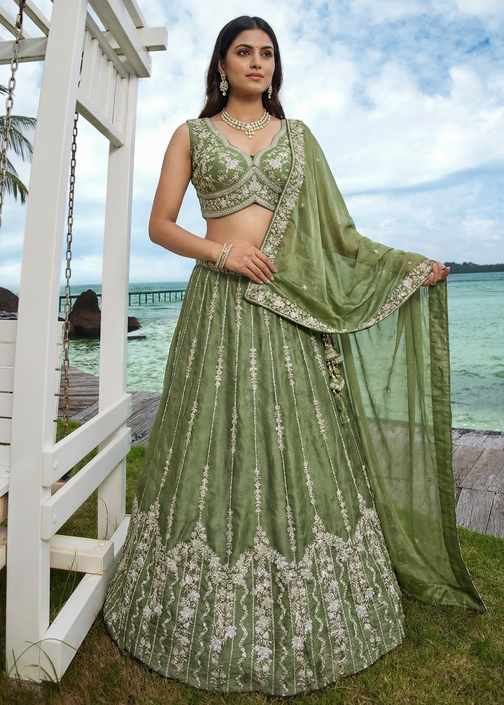 Buy Now Wedding Style Mehndi Green Chiffon Lehenga Choli Online in US, UK, Canada, France, Italy, Germany, Sweden, Austria, Switzerland &amp; Worldwide at Empress.