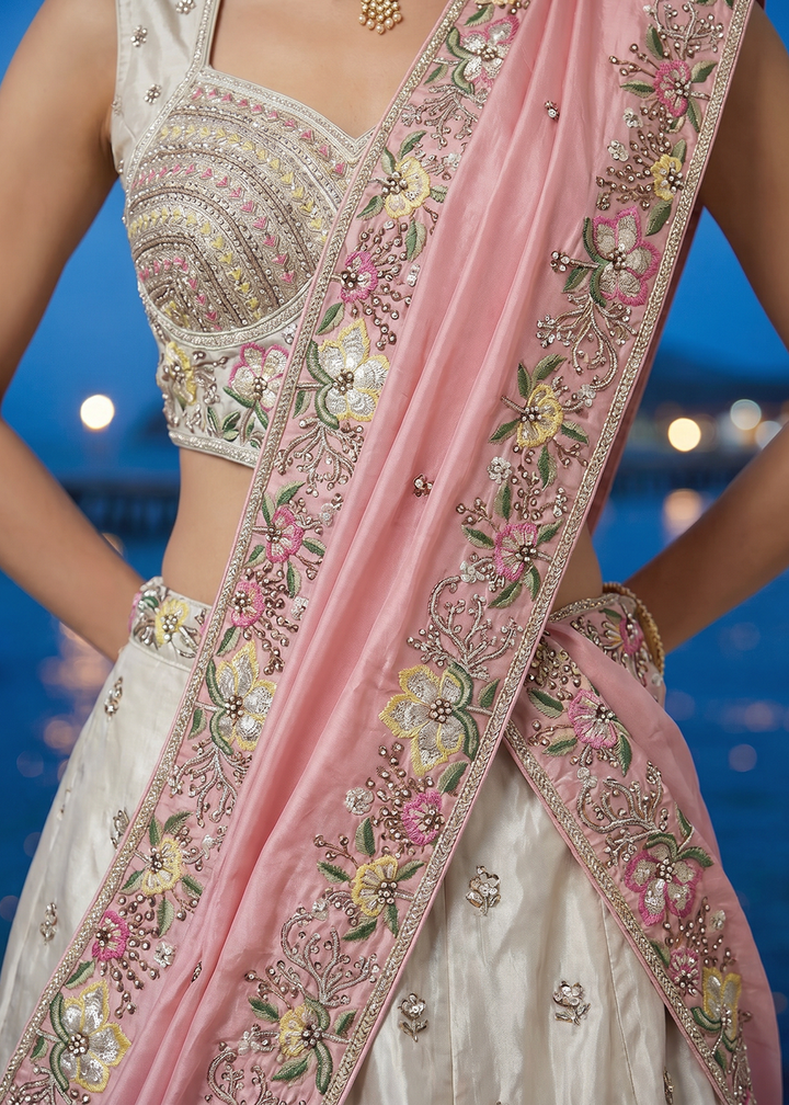 Buy Now White &amp; Pink Beads Embroidered Designer Lehenga Choli Online in US, UK, Canada, France, Italy, Germany, Sweden, Austria, UAE &amp; Worldwide at Empress.