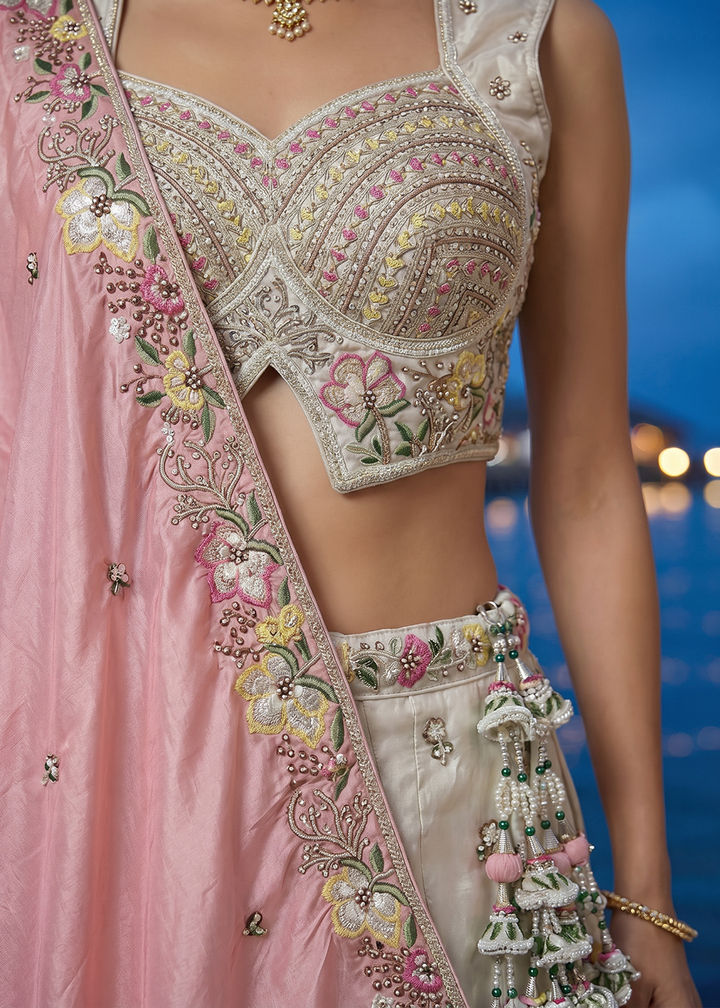 Buy Now White &amp; Pink Beads Embroidered Designer Lehenga Choli Online in US, UK, Canada, France, Italy, Germany, Sweden, Austria, UAE &amp; Worldwide at Empress.