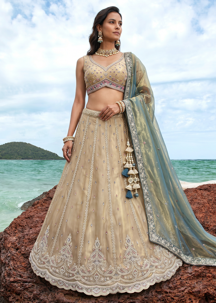 Buy Now Cream Zari Embroidered Lehenga Choli with Green Dupatta Online in US, UK, Canada, France, Italy, Germany, Sweden, Austria, UAE &amp; Worldwide at Empress.