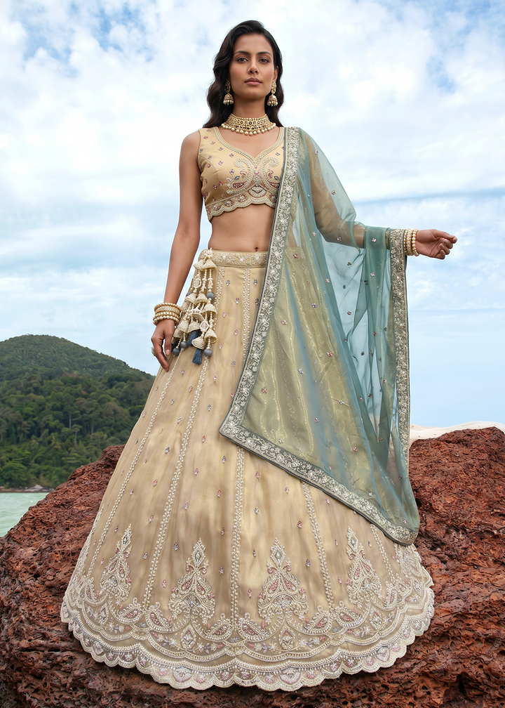 Buy Now Cream Zari Embroidered Lehenga Choli with Green Dupatta Online in US, UK, Canada, France, Italy, Germany, Sweden, Austria, UAE &amp; Worldwide at Empress.