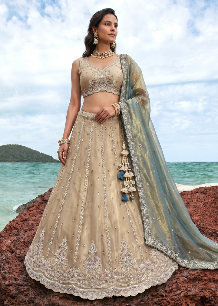 Buy Now Cream Zari Embroidered Lehenga Choli with Green Dupatta Online in US, UK, Canada, France, Italy, Germany, Sweden, Austria, UAE &amp; Worldwide at Empress.