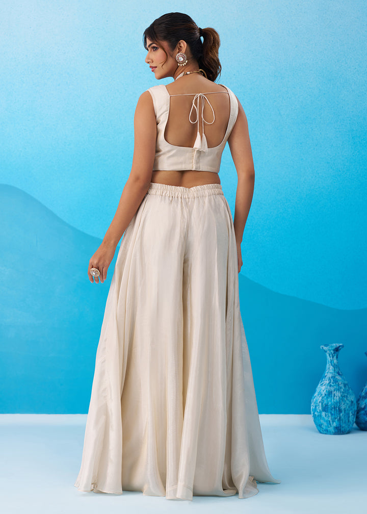 Buy Now Cream & Pink Viscose Beads Embroidered Crop Top Palazzo Set Online in US, UK, Canada, Netherlands, Germany, Italy, France, UAE & Worldwide at Empress.