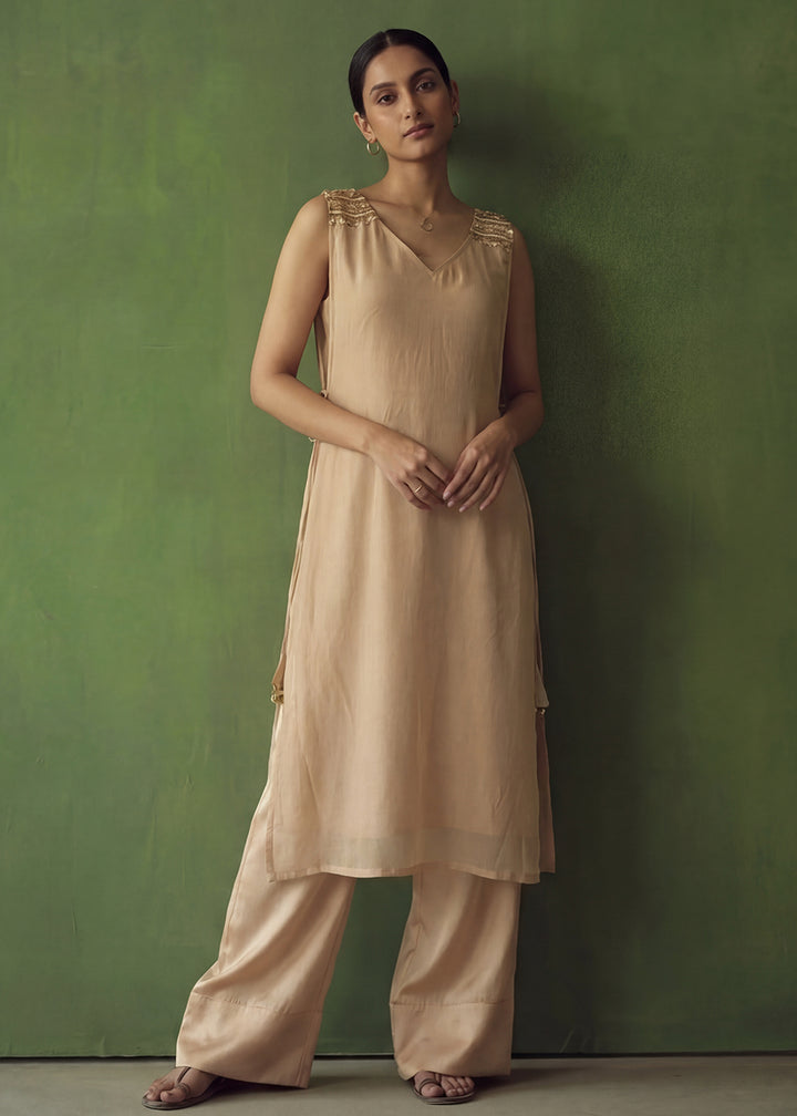 Buy Now Beige Golden Silk Crop Top with Farshi Pant & Shrug Dress Online in US, UK, Canada, Netherlands, Germany, Italy, France, Sweden & Worldwide at Empress.