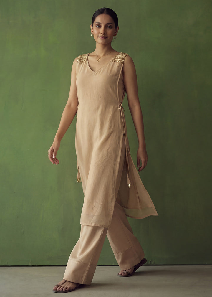 Buy Now Beige Golden Silk Crop Top with Farshi Pant & Shrug Dress Online in US, UK, Canada, Netherlands, Germany, Italy, France, Sweden & Worldwide at Empress.