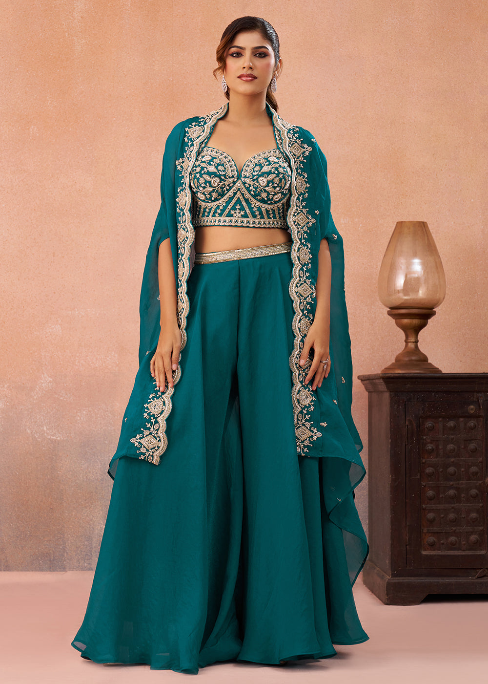Buy Now Teal Organza Indo Western Crop Top with Flared Cape Online in US, UK, Canada, Netherlands, Germany, Italy, France, Spain, UAE & Worldwide at Empress.