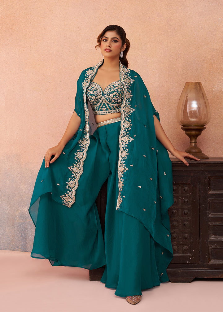 Buy Now Teal Organza Indo Western Crop Top with Flared Cape Online in US, UK, Canada, Netherlands, Germany, Italy, France, Spain, UAE & Worldwide at Empress.