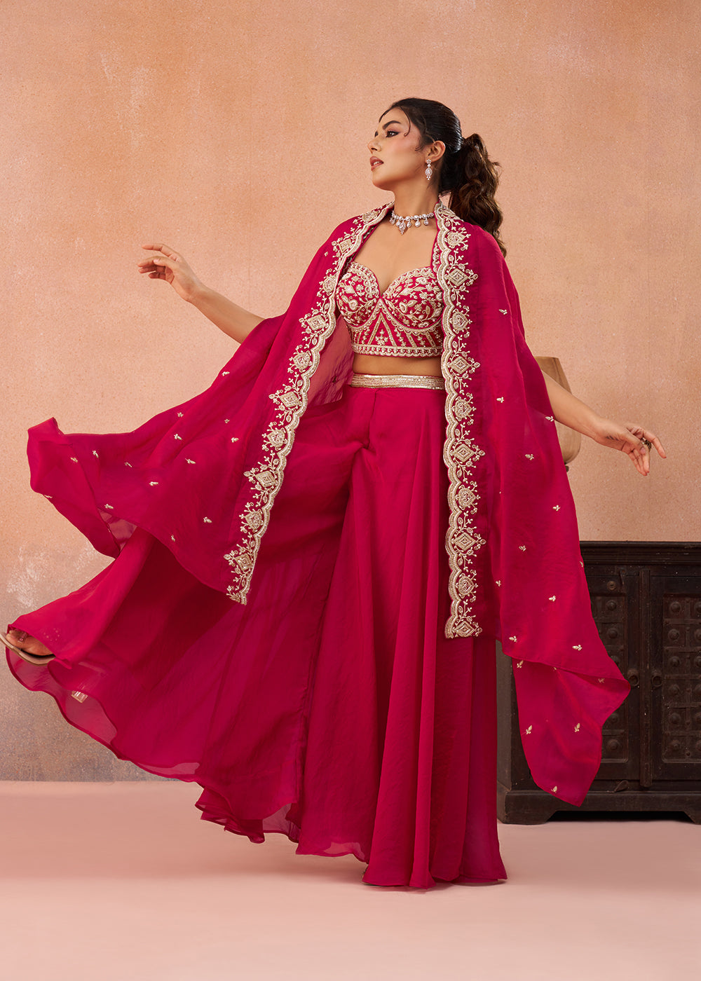 Buy Now Rani Organza Indo Western Crop Top with Flared Cape Online in US, UK, Canada, Netherlands, Germany, Italy, France, Spain, UAE & Worldwide at Empress.