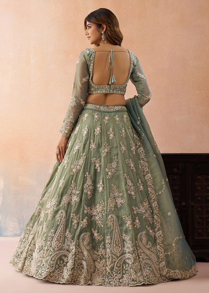Buy Now Tissue Beads & Sequins Green Wedding Lehenga Choli Online in US, UK, Canada, France, Italy, Germany, Sweden, Greece, Spain, UAE & Worldwide at Empress.