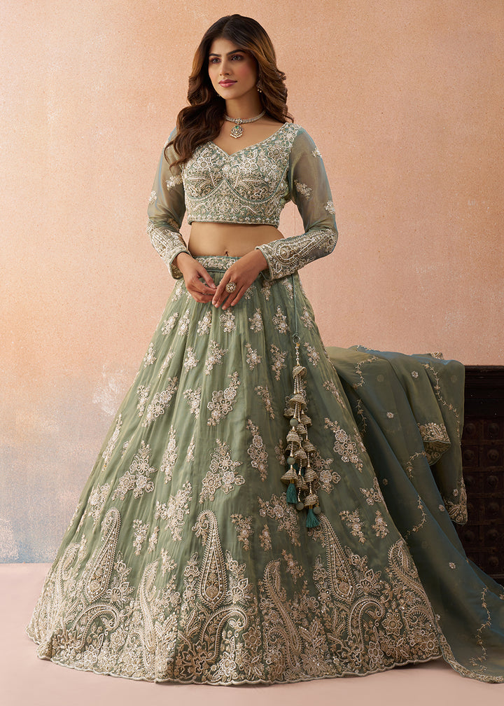Buy Now Tissue Beads & Sequins Green Wedding Lehenga Choli Online in US, UK, Canada, France, Italy, Germany, Sweden, Greece, Spain, UAE & Worldwide at Empress.