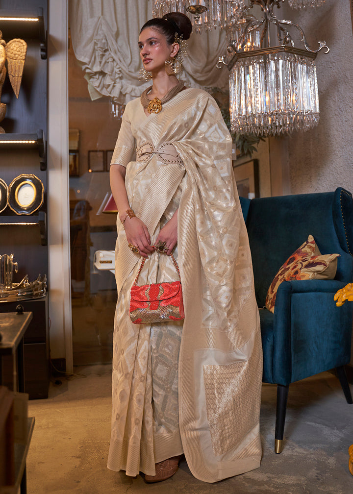 Shop Now Pretty Ivory Beige Zari Weaving Linen Designer Saree from Empress Clothing in USA, UK, Canada & Worldwide. 