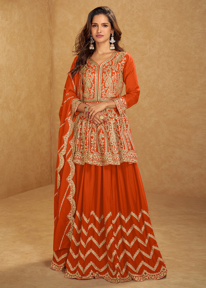 Buy Now Orange Mirror & Sequins Embroidered Festive Lehenga Skirt Suit Online in USA, UK, Canada, Germany, Italy, France, UAE, Australia & Worldwide at Empress.